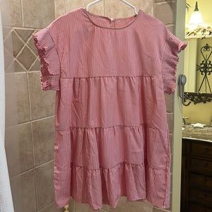 cute gameday dress!! Super comfy, would keep but a little short on me!